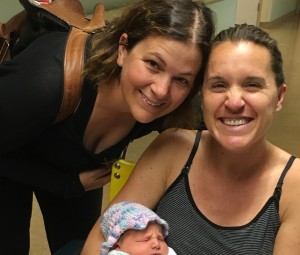 Ellie, left, celebrates with a new mama
